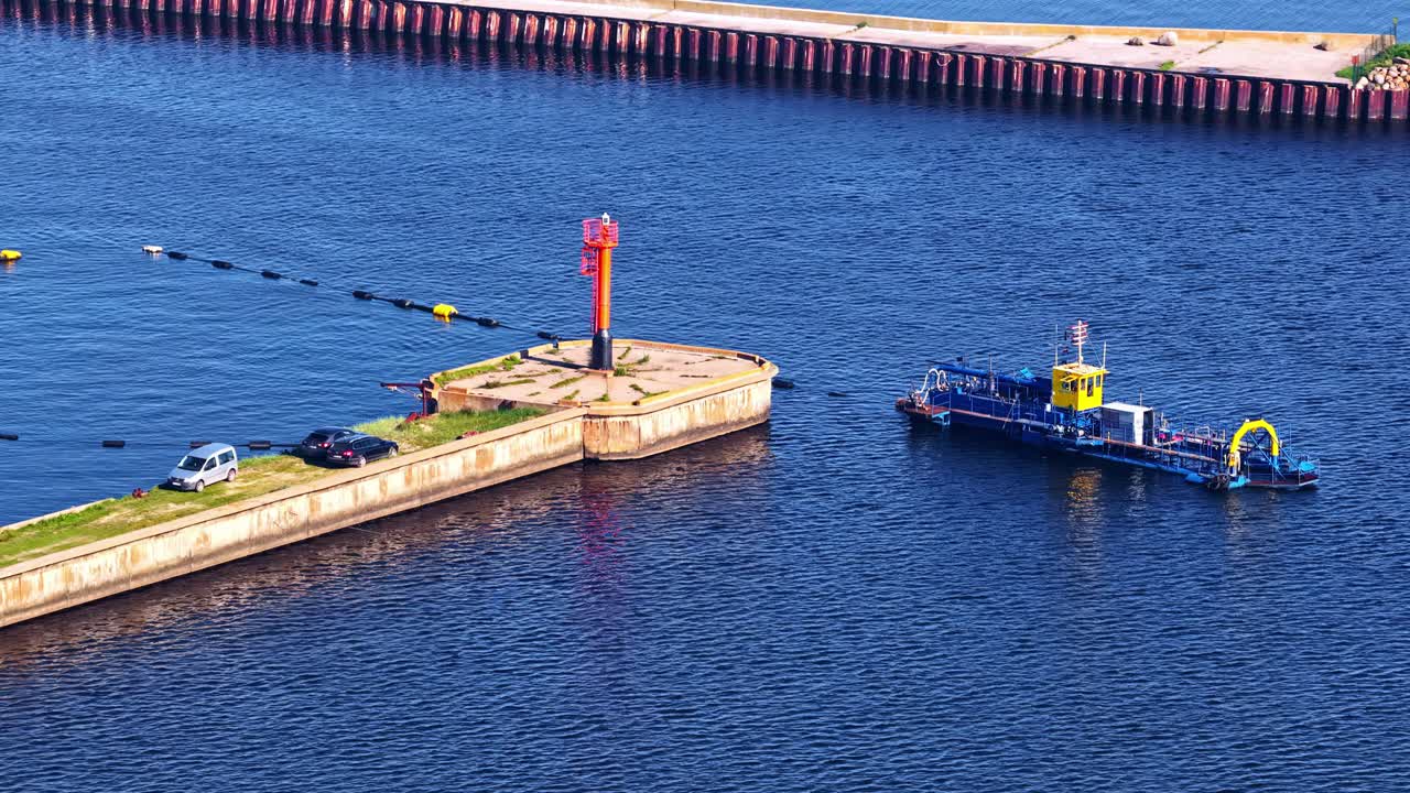 Ventspils South Pier in Latvia Baltic Sea industrial facility marina, aerial drone