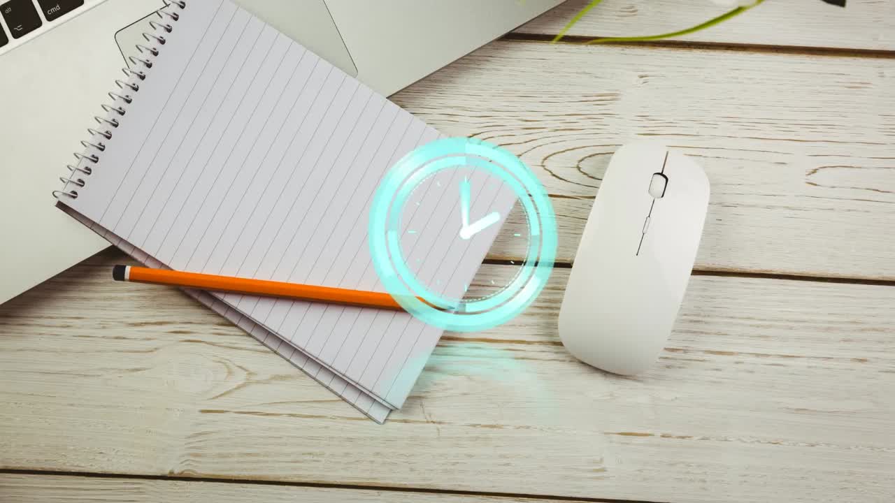 책상 위의 노트북 위의 시계의 애니메이션