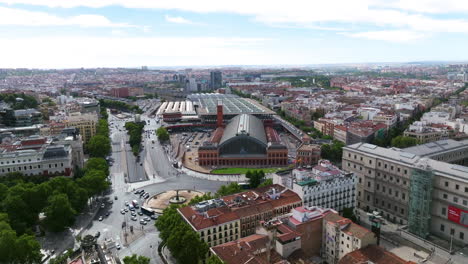 Flying-Towards-Madrid-Puerta-De-Atocha-In-Spain,-Europe