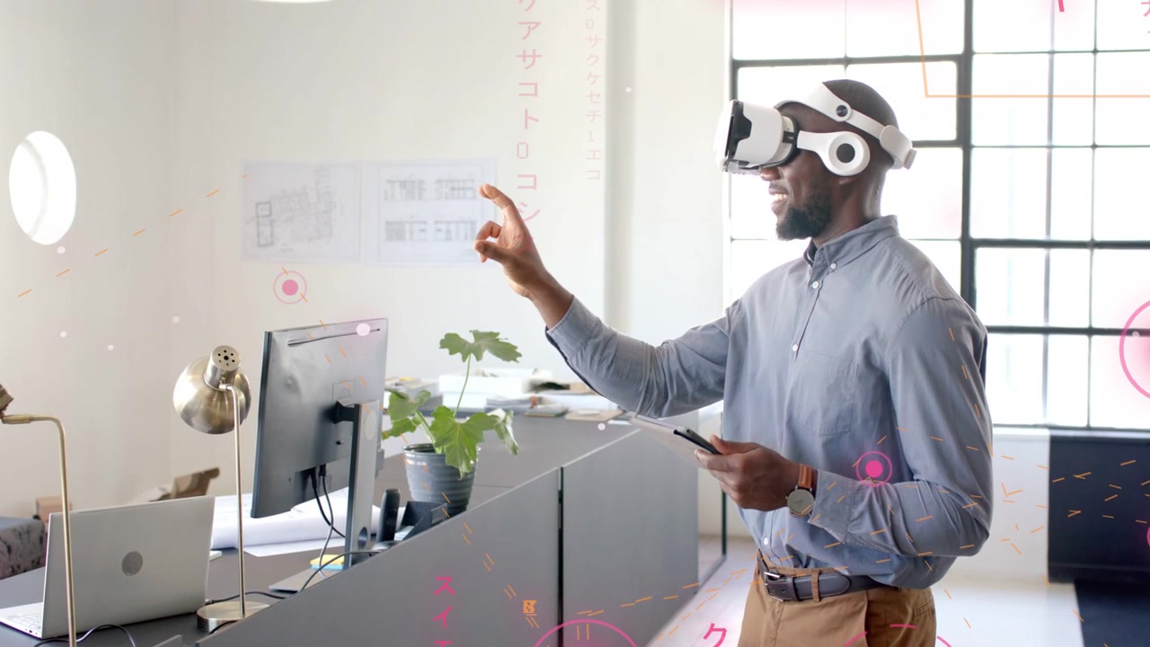 Vertical video: Man with VR headset touching chin gesturing to control pink UI via tablet to demo