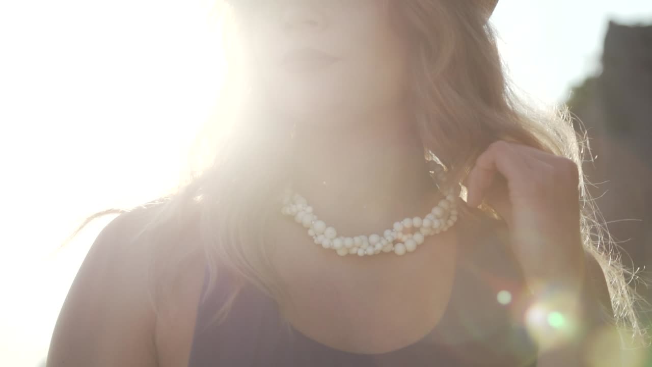 A Lovely Woman Wearing A White Beaded Necklace - Ontario Canada - Close Up Shot