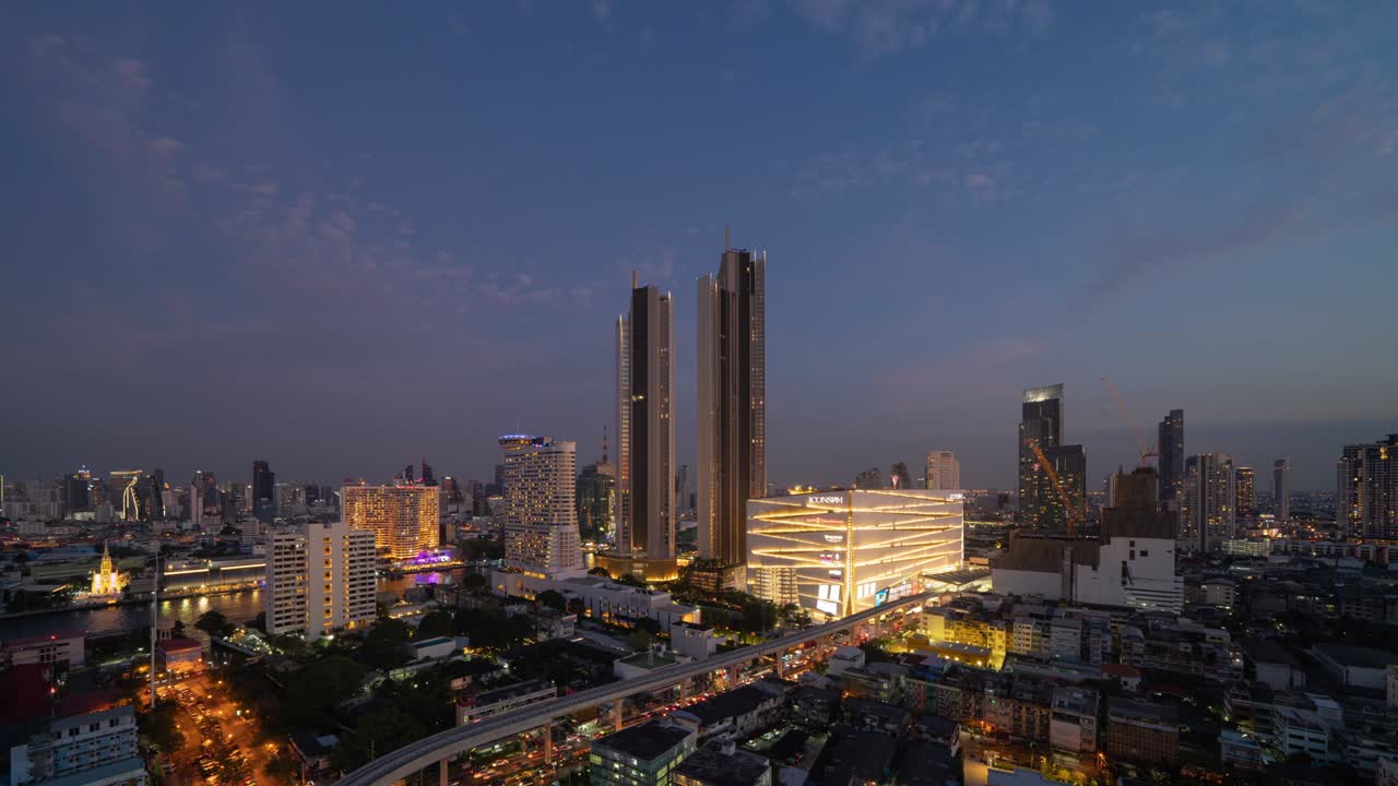 tiempo de vista aérea del icono siam, el centro de bangkok. distrito financiero y centros comerciales en la ciudad urbana inteligente de asia. rascacielos y edificios de gran altura. tailandia