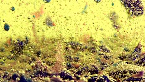 water oil bubbles  behind glass background