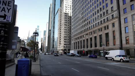 downtown chicago, illinois street corner with traffic