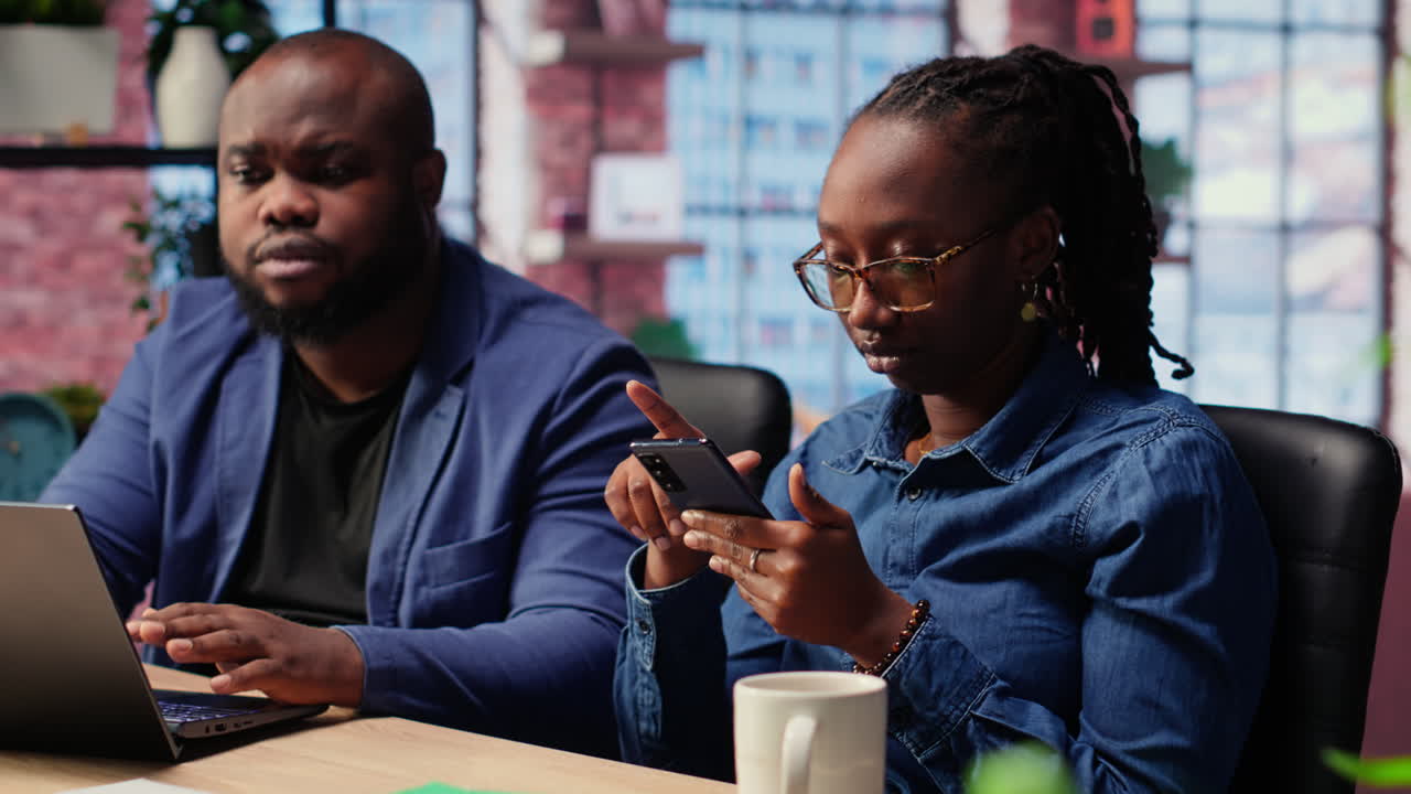 African american people solving their daily work tasks at home office