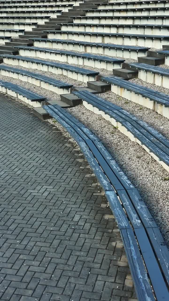 Empty outdoor steps at a serene amphitheater in Talsi, Latvia