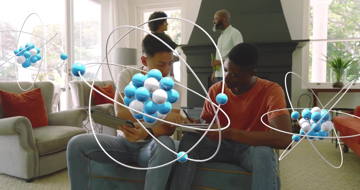 Tech team tapping tablets animating 3D models and reviewing data while background duo conversing