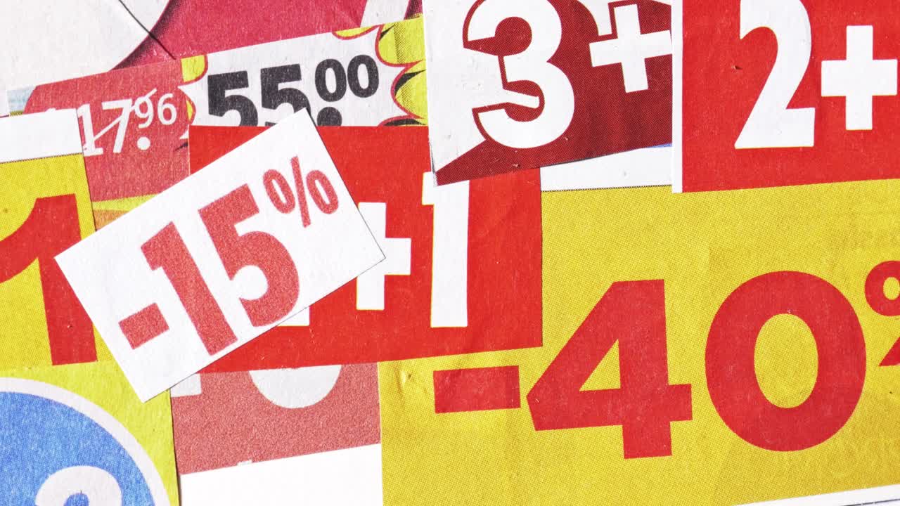 Colorful collage of discount percentages and price numerals in a smooth three point tracking move