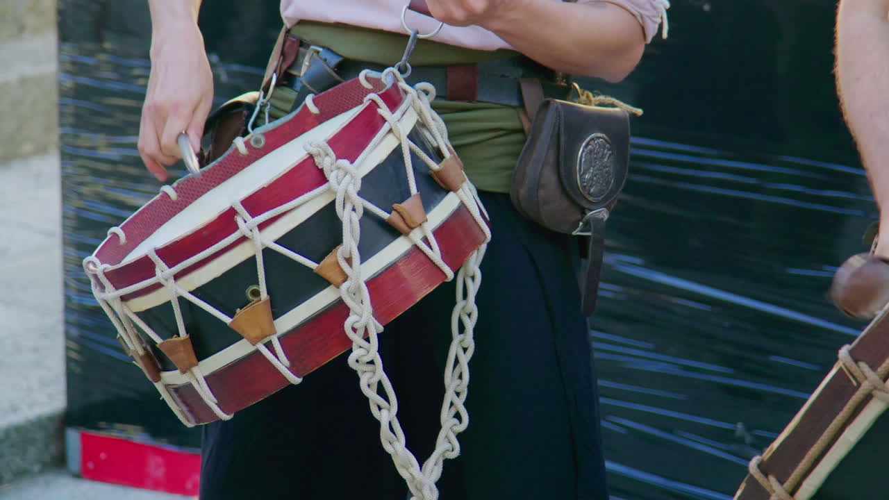 montalegre 13 september 2024 friday the 13th musician dressed with medieval clothing playing drum