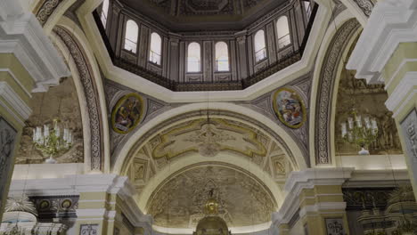 an inside view of a basilica church with its antique and artistic architecture