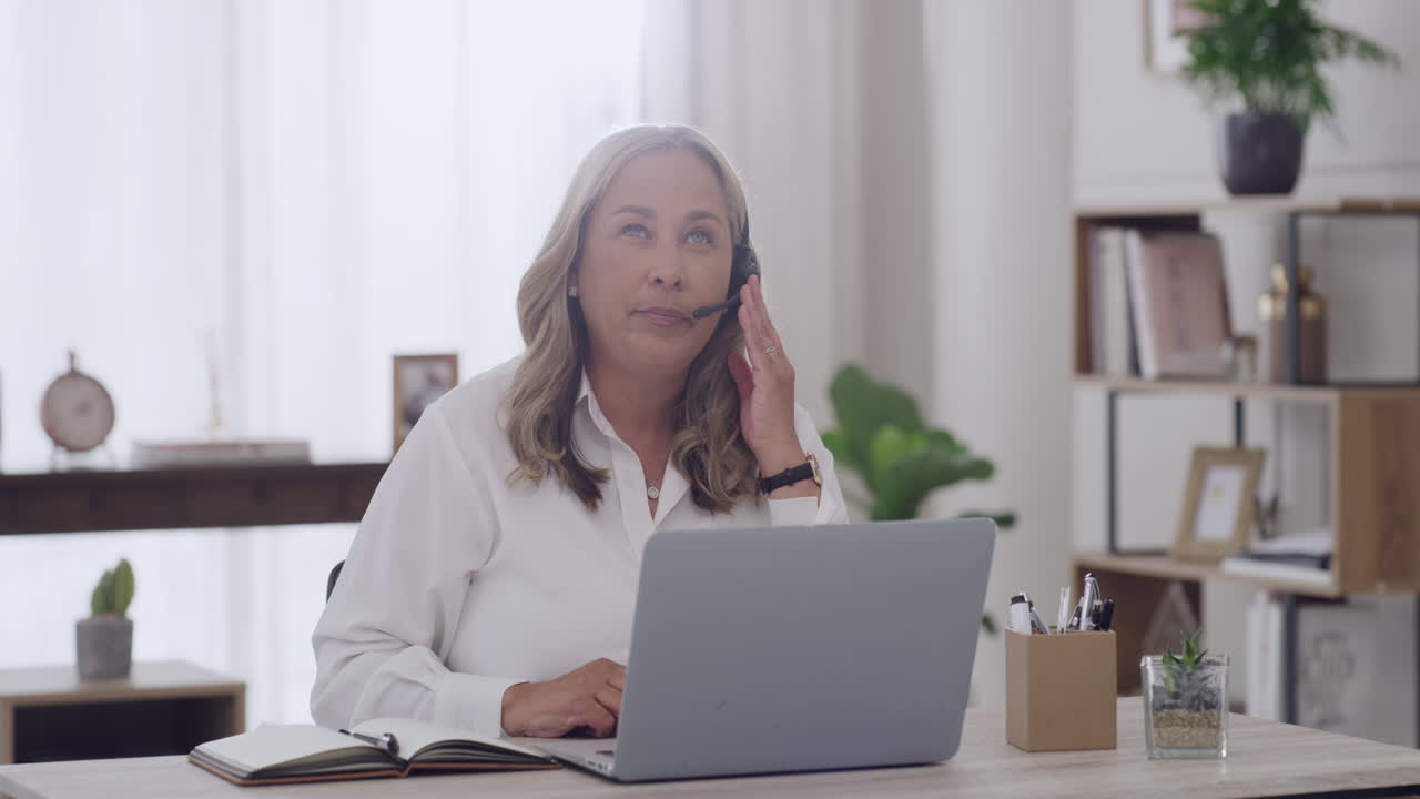 Freelance mature female call center agent wearing