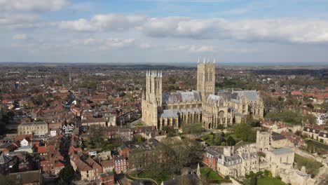 Aerial-view-of-Lincoln-Cathedral,-Lincoln-Minster,-or-the-Cathedral-Church-of-the-Blessed-Virgin-Mary-of-Lincoln-and-sometimes-St-Mary's-Cathedral,-in-Lincoln,-England