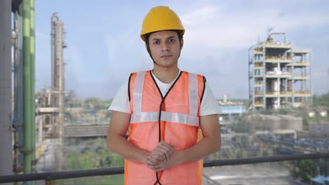 indian construction labour looking at the camera