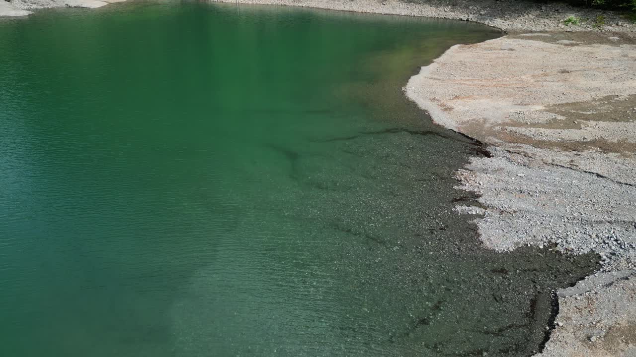 Drone view of clearly water lake Kl&ouml;ntalersee Glarus Kanton, Switzerland