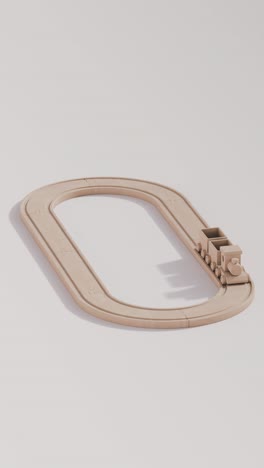 wooden toy train on oval track