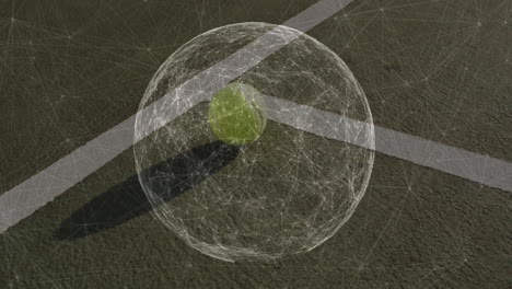 tennis ball being enclosed in rotating wireframe sphere over angled white court boundary line