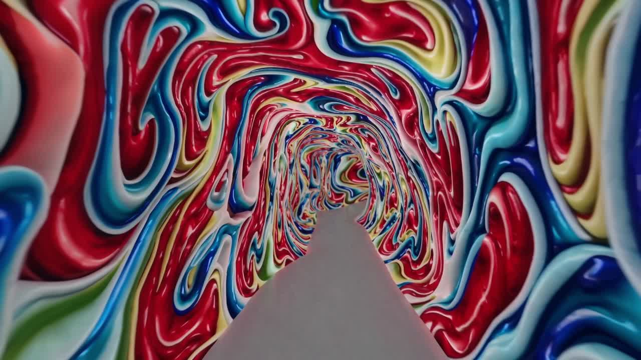 Colorful swirling tunnel with vibrant patterns and smooth textures, creating a mesmerizing visual journey through a dynamic and immersive space