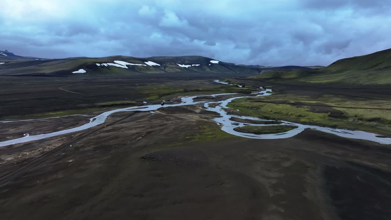 Hofsjökull glacier river system flowing through a volcanic landscape Iceland, aerial drone