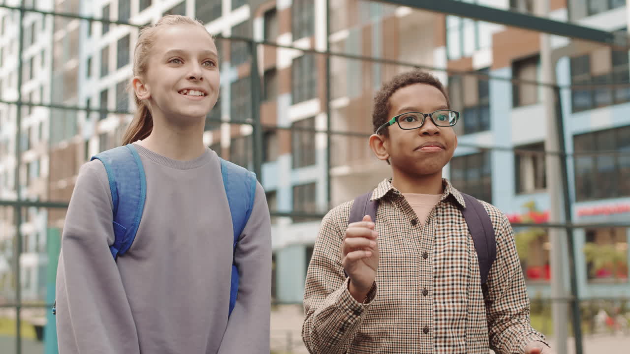Children Playing Ball Game at Sportsground