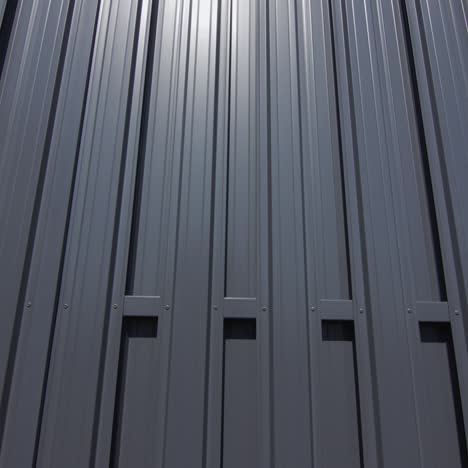 grey metal fence against blue sky 1