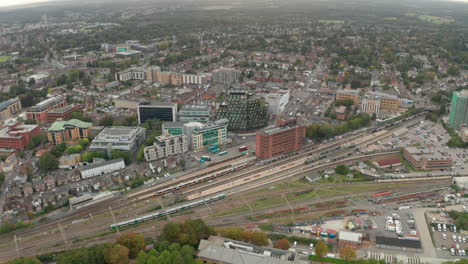 aerial shot of high speed trains passing through watford junction station