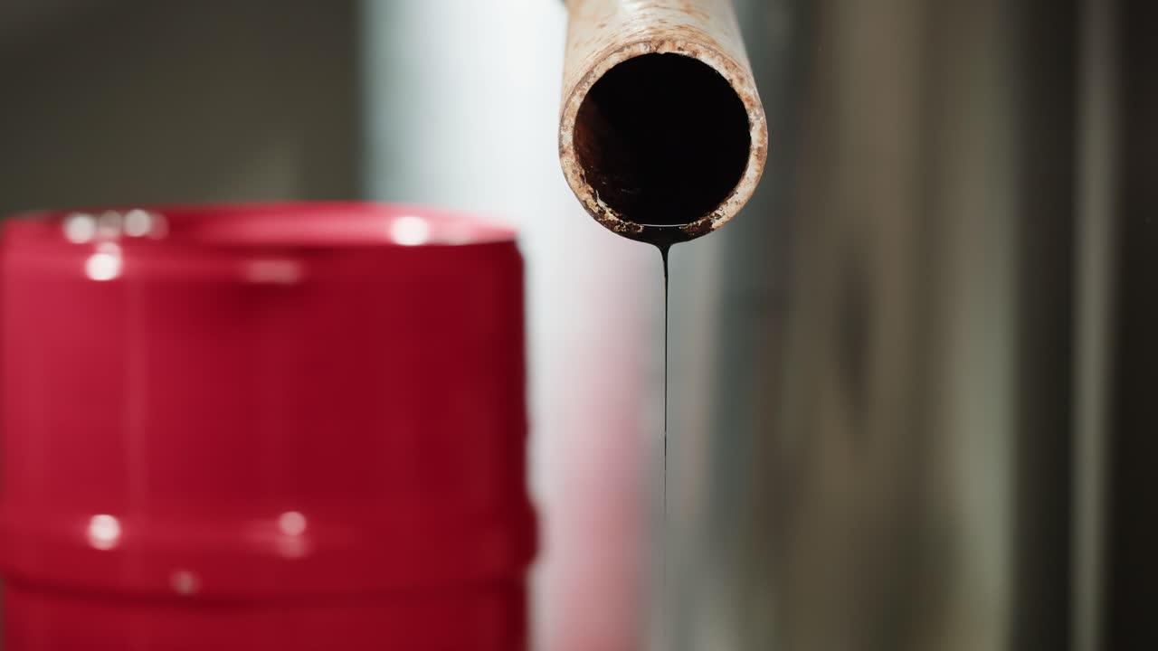 Leaking Oil from a Pipe into a Container