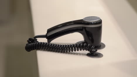 hair dryer at hotel room parlour in table wall stylish