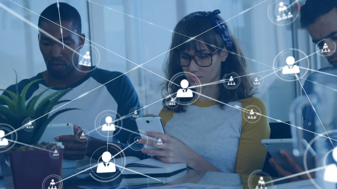 Animation of network of profile icons against caucasian woman using a smartphone at office