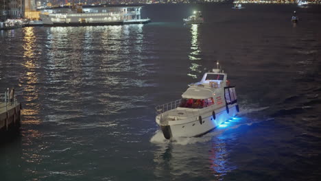 luxury yacht at night in harbour