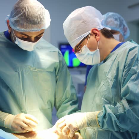 surgeon operating in hospital