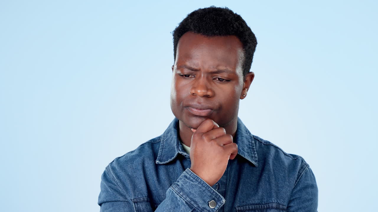 Confused man, studio or thinking of plan