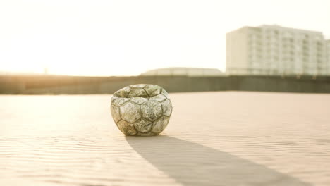 abandoned soccer ball in the desert