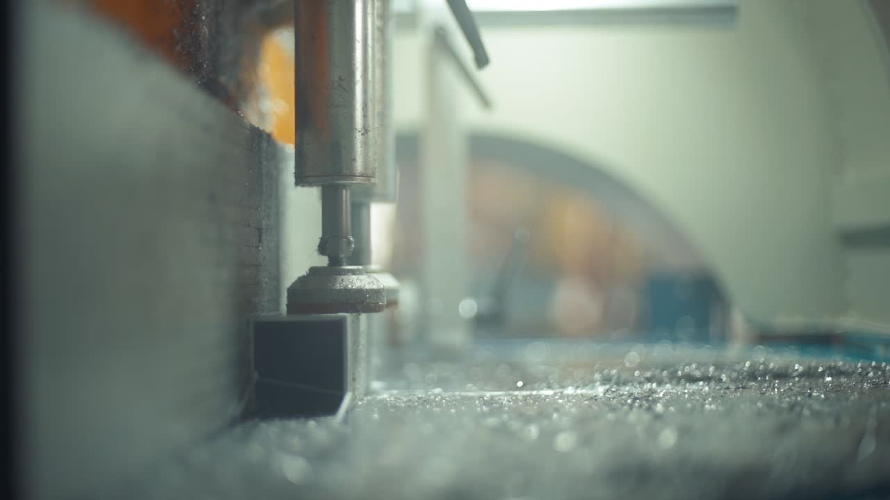 Close-up of a Metal Cutting Machine in an Industrial Setting