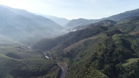 AERIAL-Misty-Scenic-Views-Of-Mountainous-Valley-Ranges