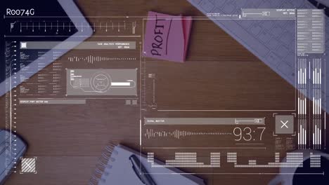 Animating-of-data-processing-against-profit-text-on-memo-notes-falling-on-wooden-office-table