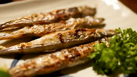 delicious grilled fish served with fresh greens