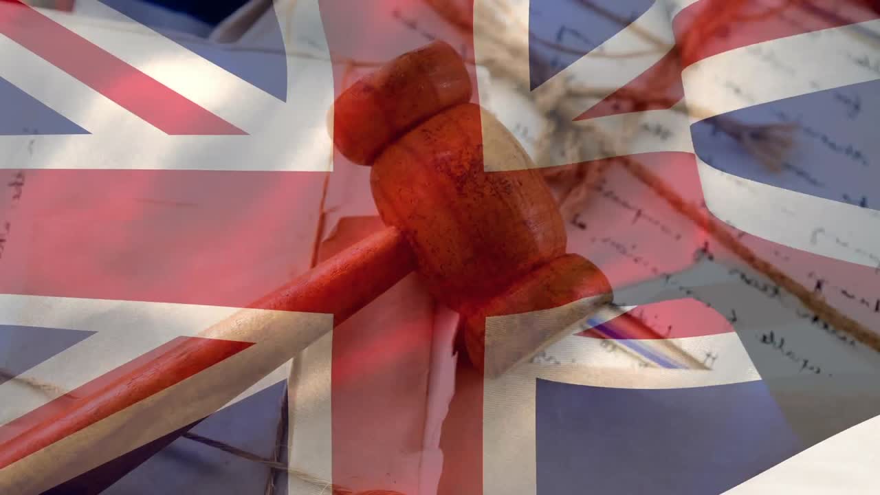 UK flag with judge gavel on documents