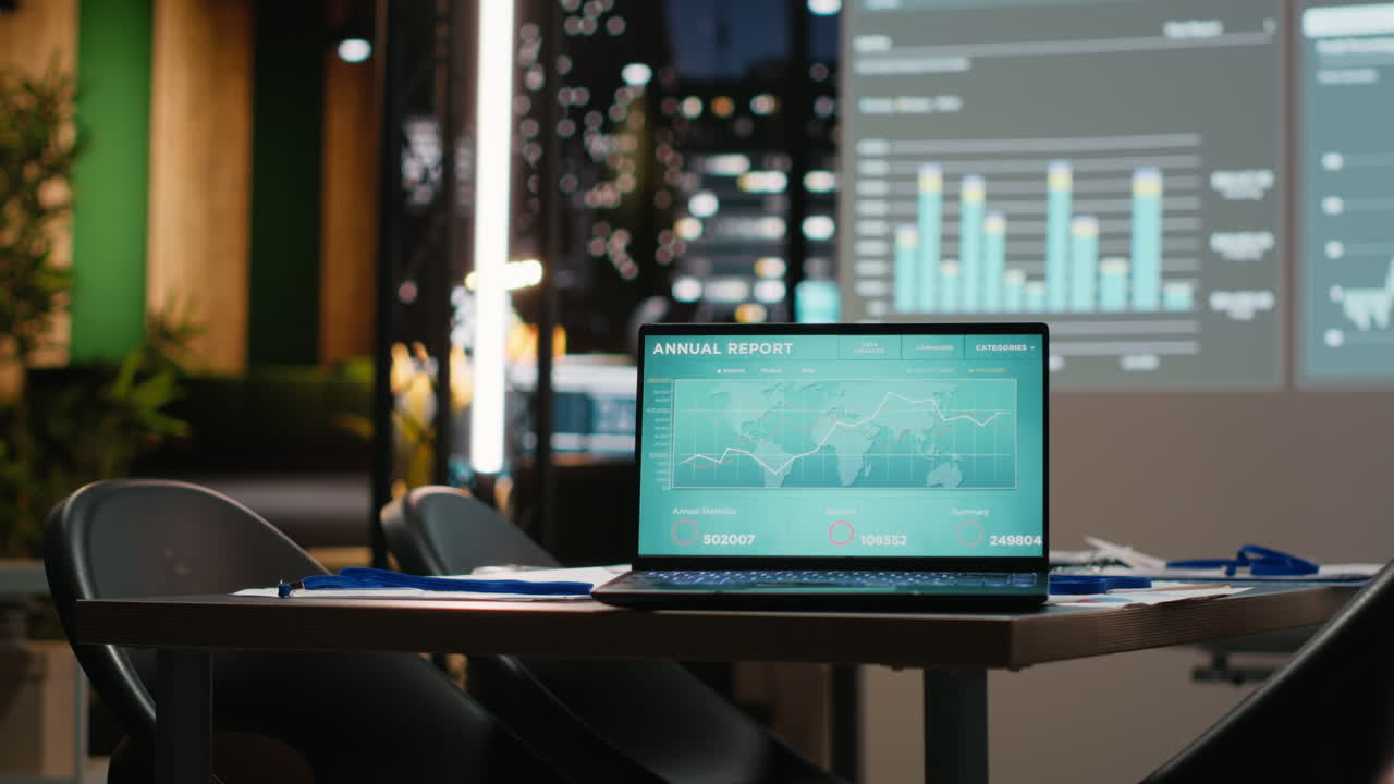 Empty boardroom in a multinational company glows with digital projections