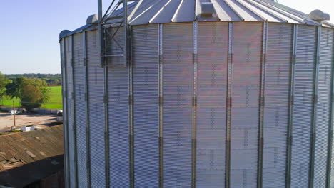 granary grain elevators. metal tanks for the storage crop. large bins for farming.
