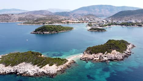 ksamil islands, albania - aerial of small sandy sand stripe and beach