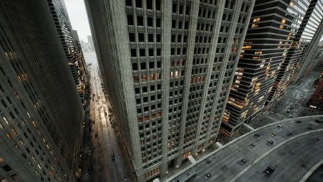 Aerial-hyperlapse-of-busy-car-traffic-in-between-Skyscrapers-city-center