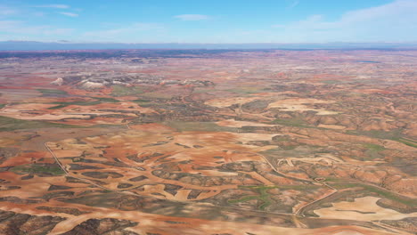 aerial shot spain desert landscape sunny day red soil wild area santa maria