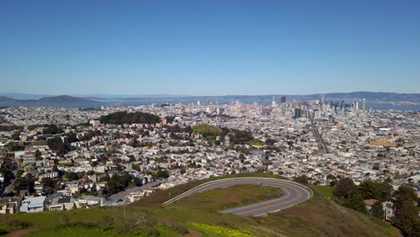 Slow-panning-shot-of-the-City-of-San-Francisco,-on-a-clear-sunny-day,-taken-from-the-top-of-Twin-Peaks