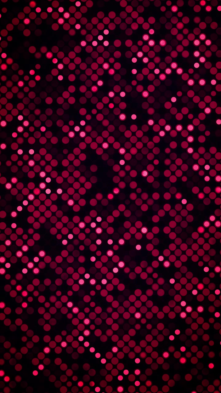 Abstract digital wallpaper showcasing an electronic matrix grid composed of numerous luminous magenta, pink, and red circular nodes. Pixel dot background. Loop animation. Vertical video.