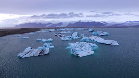 set of icebergs floating in jukulsaron glacial lagoon in iceland