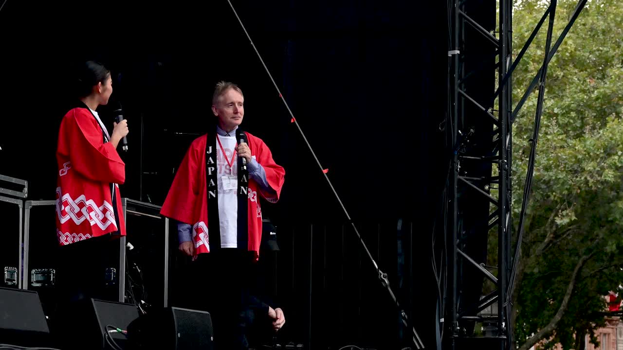 People on stage mentioning Japan Matsuri, Trafalgar Square, London, United Kingdom