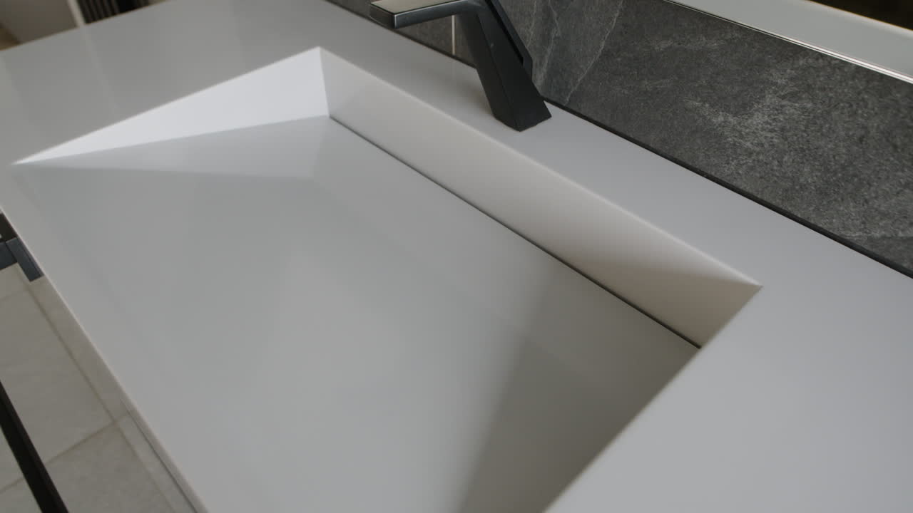 Modern Bathroom Sink with Black Faucet
