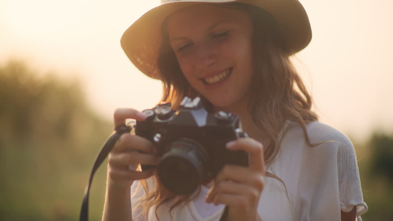 Positive young girl exploring through lens
