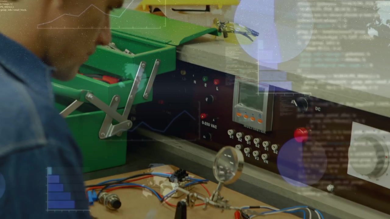 Tech inspecting opening boxes routing wires adjusting panel for electronic test with data overlays