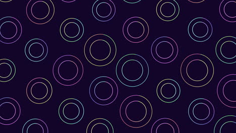 colorful circles in a pattern on dark background